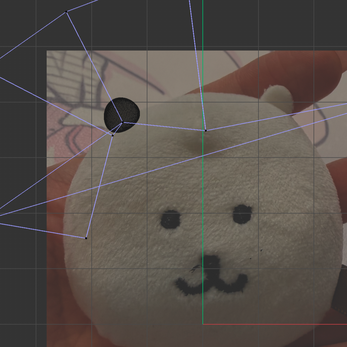 Small sphere positioned to create the first ear